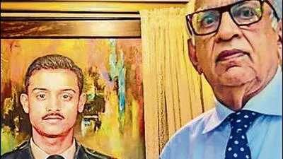 Colonel-VN-Thapar--right--next-to-a-portrait-of-Ca_1721458870589